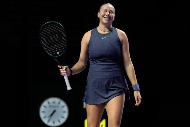 Amanda Anisimova of the United States gestures during her women’s singles match against Iga Swiatek of Poland at the WTA tennis finals in Riyadh, Saudi Arabia yesterday.