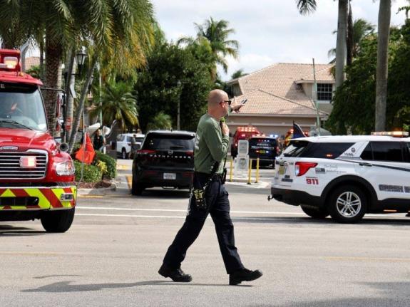 Emergency personnel from Coral Springs and Coconut Creek are on scene where a plane crashed in the Windsor Bay community in Coral Springs on Monday, November 10, 2025. (Carline Jean/South Florida Sun-Sentinel via AP)