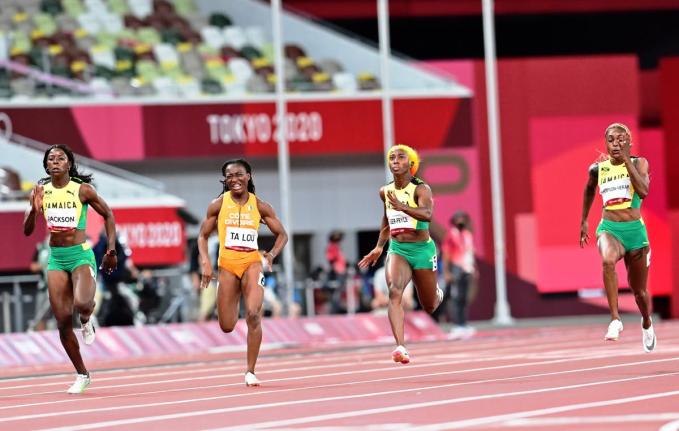 From left: Shericka Jackson, Marie-Josee Ta Lou, Shelly-Ann Fraser-Pryce, and Elaine Thompson-Herah compete in the 100m women’s finals at the Tokyo 2020 Olympic Games.