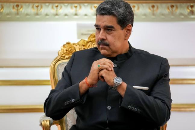 Venezuelan President Nicolás Maduro attends a meeting at Miraflores presidential palace in Caracas, Venezuela, February 20, 2024. (AP Photo/Ariana Cubillos, File)
