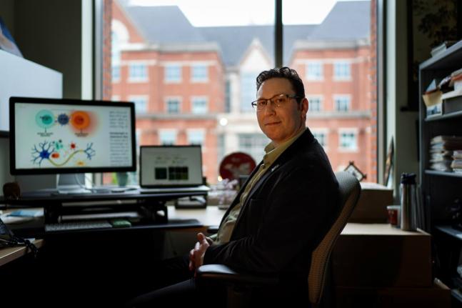 Biomedical engineer Jordan Green sits for a photo in his office at Johns Hopkins University in May 2025, in Baltimore, USA. 							