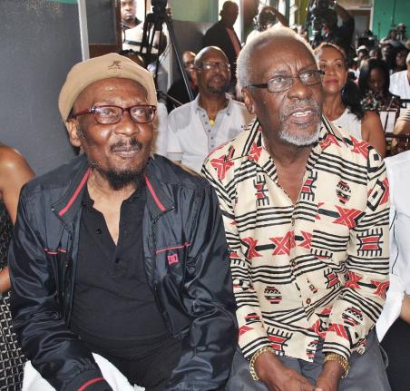 Entertainer Jimmy Cliff (left) and former Prime Minister P.J. Patterson.