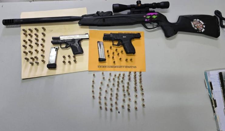 Guns and ammunition seized by the police in Parry Town, St Ann on November 24, 2025.