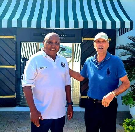 Dr Leahcim Semaj shares lens time with Round Hill Hotel and Villas managing director, Josef Fortsmayr, during one of his mindspa workshops for staff at the Montego Bay resort.