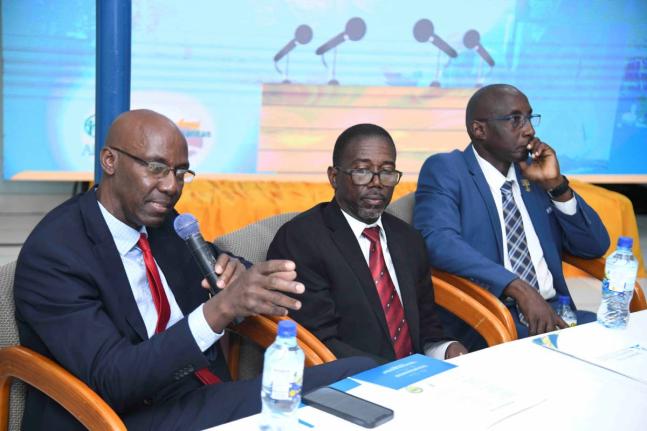 Pastor Everett Brown (left), president of the Jamaica Union Conference of Seventh-day Adventists (JAMU), gives an address to the media as Wenford Henry (centre), country director for the Adventist Development and Relief Agency Jamaica, and Adlai Blythe, tr