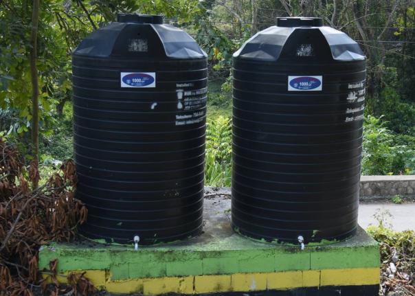 Kristen Gyles writes: ...  how does everyone having a big black tank at the back of their property solve the issue of national water shortage?