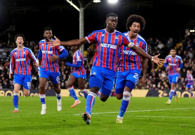 Crystal Palace’s Marc Guehi (front) celebrates after scoring his side’s second goal during the English Premier League  match between Fulham and Crystal Palace in London yesterday.
