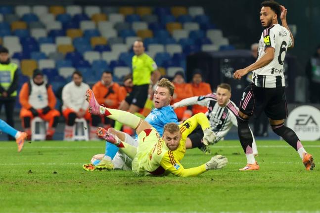  Napoli’s Rasmus Hojlund (centre)  scores the opening goal during the Serie A  match between Napoli and Juventus in Naples, Italy, yesterday.