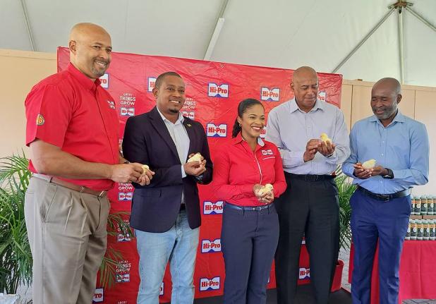 Agriculture and Fisheries Minister Floyd Green (second left), flanked by (from left) HI‑Pro Vice-President Jaimie Ogilvie, farm store manager Sherrae Wong‑Black, Michael Pryce, chairman of the Ministry of Agriculture’s Hurricane Melissa Recovery Task