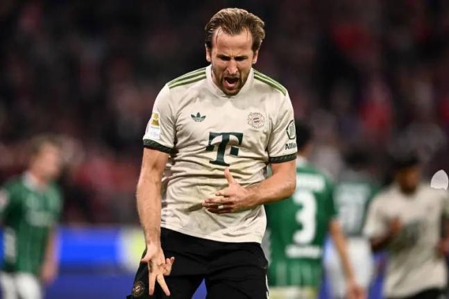 Bayern’s Harry Kane celebrates scoring from the penalty spot during the Bundesliga match between Bayern Munich and Werder Bremen at the Allianz Arena in Munich, Germany, on September 26.