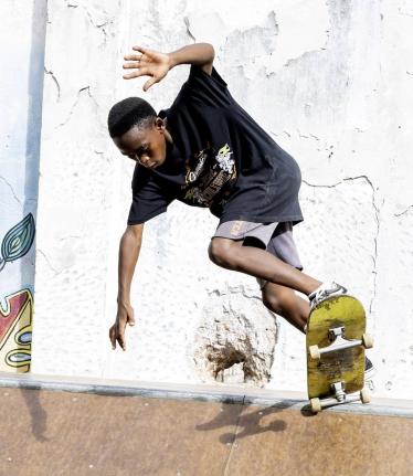 Ramese Wright of the EDUSKATEME Team  in action at the Germaican Skate Tour at Kingston Creative parking lot on Water Lane last weekend.