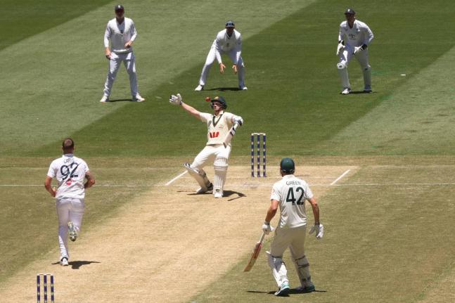 Australia’s Steve Smith (centre) watches a delivery from England’s Brydon Carse (left) on Day 2 of their Ashes cricket Test match in Melbourne on Saturday.