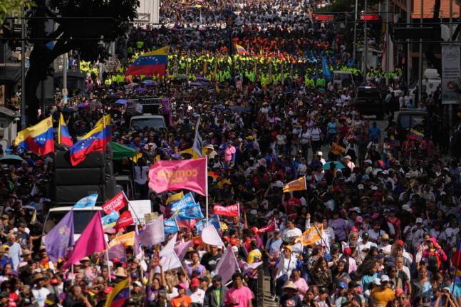 Government supporters gather for a women’s march to demand the return of Venezuelan President Nicolas Maduro in Caracas, Venezuela, on Tuesday, January 6, three days after US forces captured him and his wife. 
