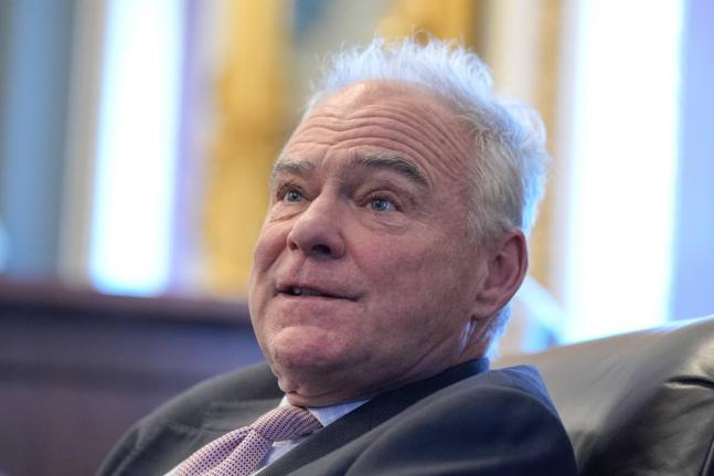 US Senator Tim Kaine, a Democrat, speaks to reporters about a war powers resolution regarding Venezuela on Capitol Hill on January 7, 2026, in Washington. 