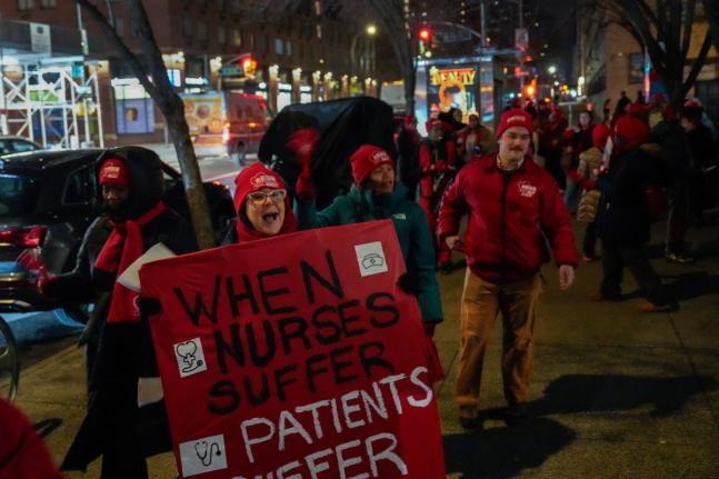 Nurses strike outside Mount Sinai West Hospital, Monday, January 12, 2026, in New York. (AP Photo/Yuki Iwamura)