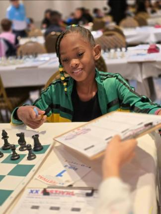Je’Nasiya Mais competing at the 20th Central American and Caribbean (CAC) Youth Chess Festival in Dorado, Puerto Rico, last month.