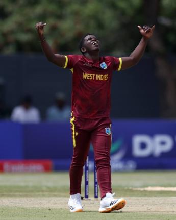 West Indies Under-19 bowler Vitel Lawes celebrates a wicket.