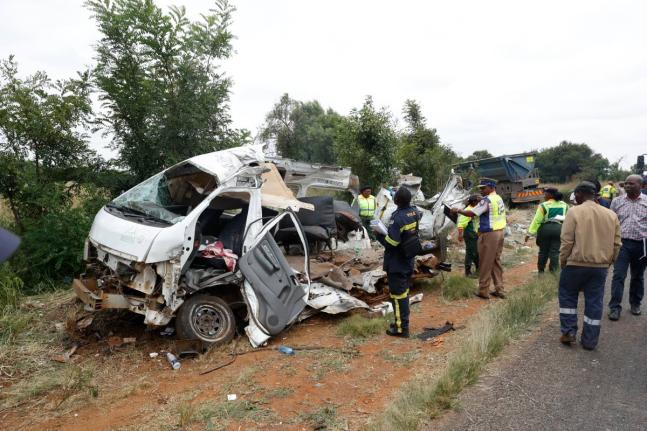 Police inspects the scene of a collision between a truck and a minibus carrying school children in Vanderbijlpark, South of Johannesburg, South Africa, Monday, January 19, 2026. (AP Photo)