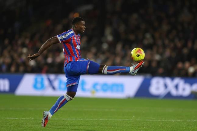 Crystal Palace’s Marc Guehi controls the ball during an English Premier League football match against Tottenham Hotspur in London on Sunday, December 28, 2025. 