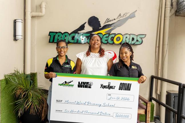 Usain Bolt’s Tracks and Records (UBTR), along with dancehall artiste Govana and Yung Kings Entertainment, has partnered to donate $600,000 to Mount Ward Primary School in Hanover. Jizell Cowan (left), marketing manager of  UBTR, flanks Mount Ward Primary