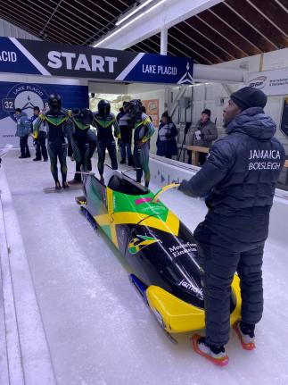 Members of the Jamaica four-man bobsled team ahead of action at the North American Cup.