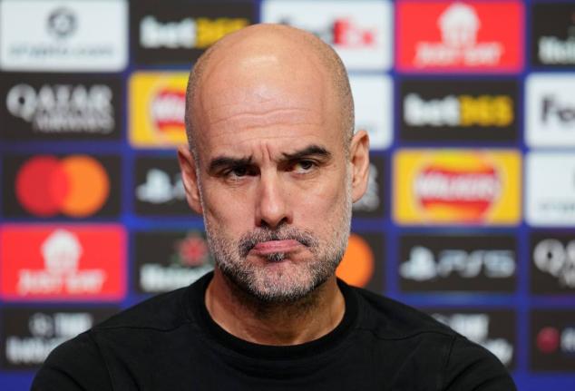 Manchester City manager Pep Guardiola looks on during a press conference in Manchester, England yesterday, one day ahead of their Champions League football match against Galatasaray. 