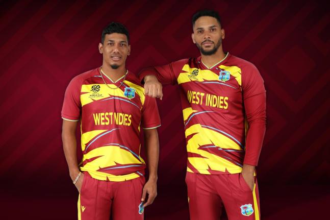 West Indies players Gudakesh Motie (left) and Brandon King sport their new kits, courtesy of a partnership with apparel brand Macron.