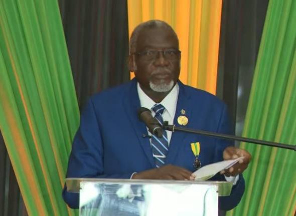 Bishop Conrad Pitkin, custos of St James, addresses the commissioning ceremony for 28 new justices of the peace for St James at the Grand-A-View Event Place in Montego Bay, St James, on January 30.