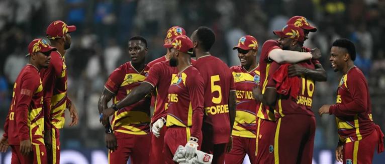 West Indies players celebrate a win over England in their second Group C ICC T20 World Cup cricket game at the Wankhede Stadium in Mumbai, India, on February 11, 2026. 