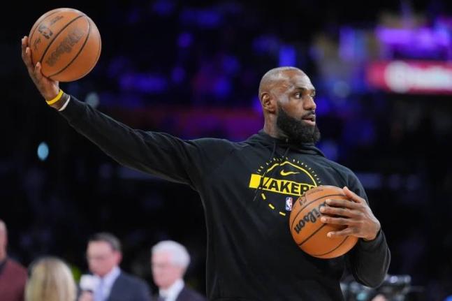 Los Angeles Lakers forward LeBron James warms up before the team’s NBA basketball game against the Golden State Warriors Saturday, February 7, 2026, in Los Angeles. 