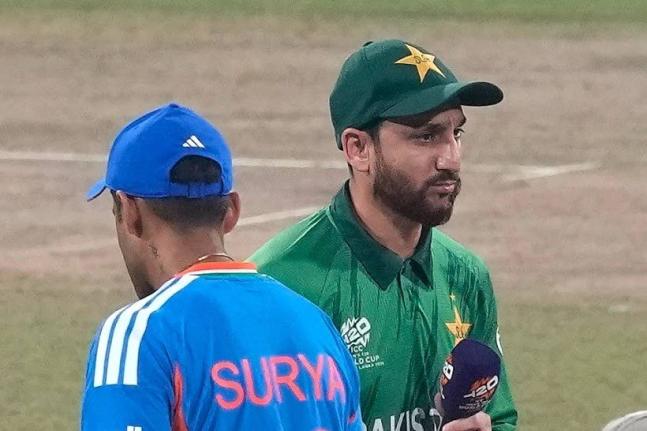 India’s captain Suryakumar Yadav (left)  and Pakistan’s captain Salman Ali Agha walk past each other after the coin toss of the T20 World Cup cricket match between India and Pakistan in Colombo, Sri Lanka, yesterday.