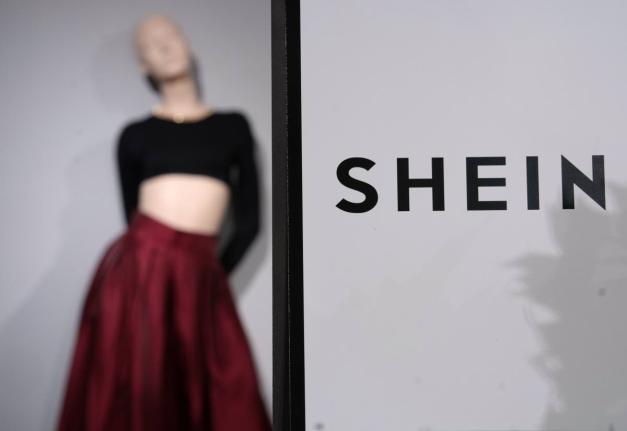 Clothes by Chinese company Shein are seen in the BHV (Bazar de l'Hotel de Ville) department store, Tuesday, November 4, 2025 in Paris. (AP Photo/Aurelien Morissard, File)