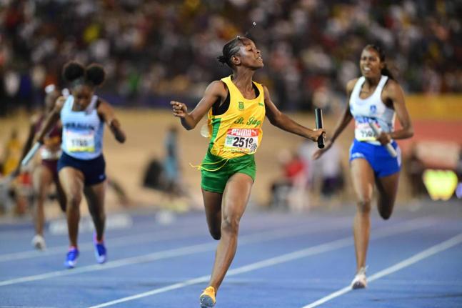 St Jago’s Class 3 team on the way to winning the 4x100 metres at the ISSA/GraeKennedy Boys and Girls’ Athletics Championships in 2024.