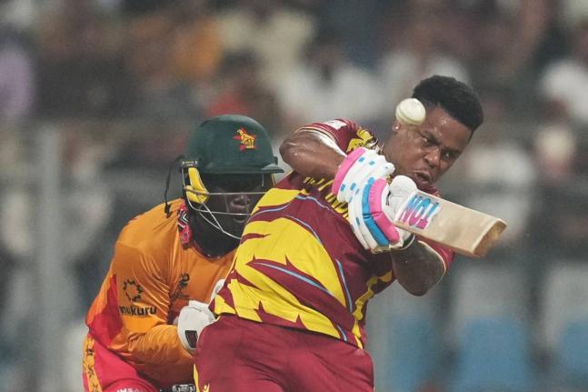 West Indies’ Shimron Hetmyer hits a six during the T20 World Cup match against Zimbabwe in Mumbai, India, yesterday.