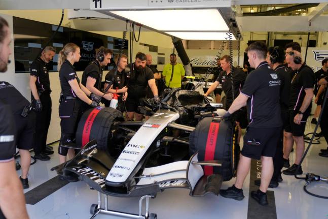
Mechanics of Cadillac driver Valtteri Bottas of Finland prepare his car during a Formula One pre-season test at the Bahrain International Circuit in Sakhir, Bahrain.