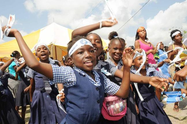 Students of Homestead Primary School in Spanish Town, St Catheriine take part in a Peace and Love in Society Peace Day concert at the school.