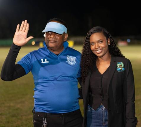 St Thomas FA President Lascelles Logan gives a high five, representing the announcement of a $5.1m sponsorship, courtesy of McKay Security, to the parish’s football. Logan is joined by McKay Security’s Jessica Jackson at Ash Wednesday’s launch of the
