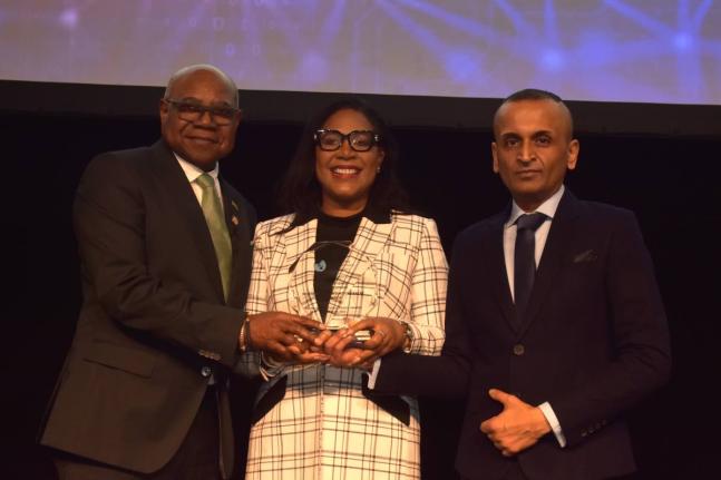 Mureen James (centre), executive director of the Montego Bay Convention Centre, accepts one of two awards from Yatan Ahluwalia (right), secretary general of the Pacific Area Travel Writers Association (PATWA), and Jamaica’s tourism minister, Edmund Bartl