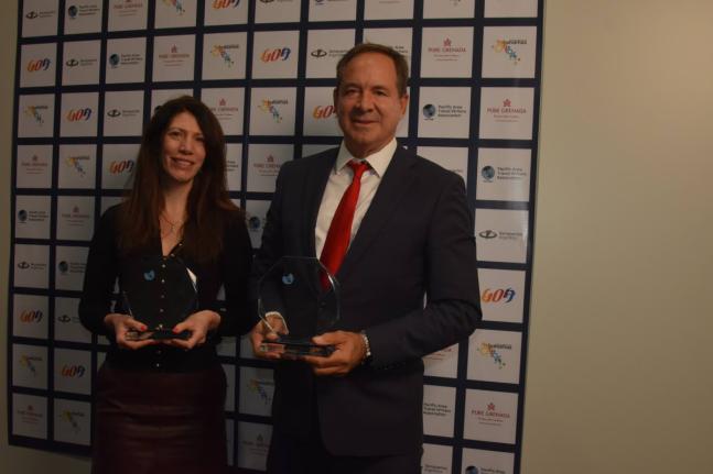CEO of S Hotels Jamaica, Christopher Issa, and his UK representative, Victoria Cranmer, pose with the two awards they were recognised with at the PATWA International Travel Awards 2026 during the ITB trade show in Berlin, Germany, last Wednesday.