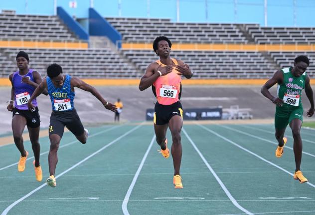 Zachary Wallace (second right), unattached, wins the under-20 400 metres at the Carifta Trials on the weekend with a personal best of 45.77. He finished ahead of Junior Gallimore (second left) of Hydel, who placed the second with a personal best of 45.87. 