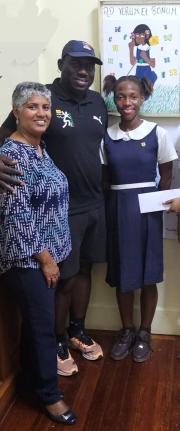 From left: Convent of Mercy Academy (Alpha) principal, Kali McMorris, head coach, Kirk King, and athlete Imani Lowe. 