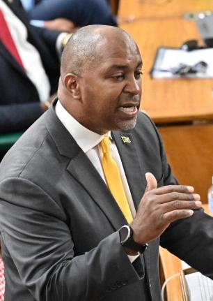 Opposition Spokesman on Finance Julian Robinson making his contribution to the 2026/2027 Budget Debate in Parliament on March 12, 2026.