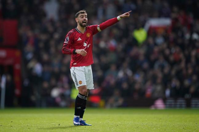 Manchester United's Bruno Fernandes reacts during the Premiier League football match between Manchester United and Aston Villa in Manchester, England on March 15, 2026. (AP Photo/Dave Thompson)