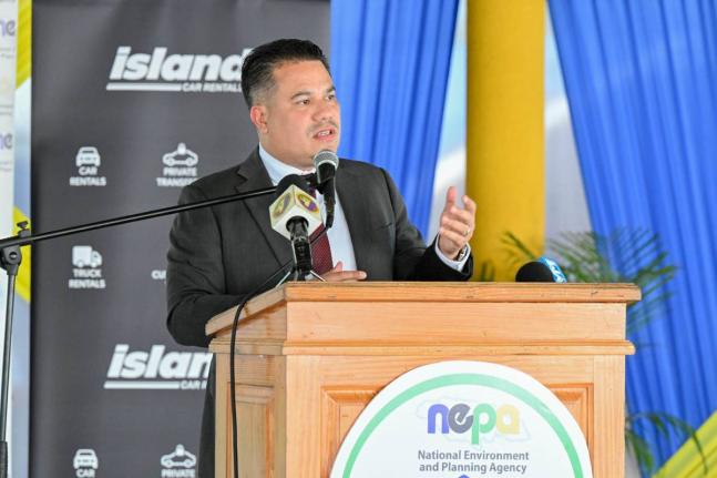 Minister of Water, Environment and Climate Change,  Matthew Samuda, delivering the keynote address during a recent National Schools Environmental Clubs Student Workshop, hosted by the National Environment and Planning Agency (NEPA) at Titchfield High Schoo