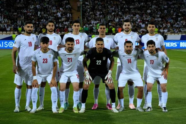Iran’s players pose for a team photo before an Asian group A qualifying football match against North Korea for the 2026 World Cup, June 10, 2025, at Azadi Stadium in Tehran, Iran. 