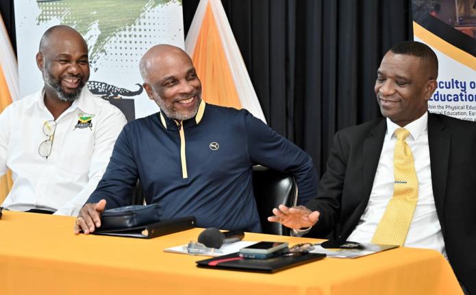 From left: Calbert Hutchinson, president of Jamaica Lacrosse; Christopher Samuda, president of the Jamaica Olympic Association, and Dr Asburn Pinnock, president of Mico University College speak at press conference at the Mico University College in Kingston