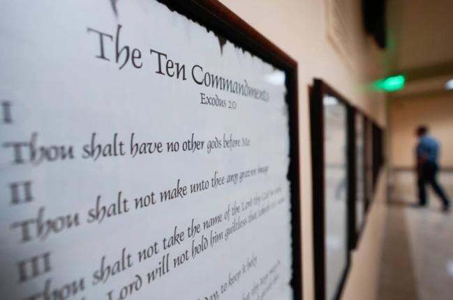 A copy of the Ten Commandments is posted along with other historical documents in a hallway of the Georgia Capitol on June 20, 2024, in Atlanta. 
