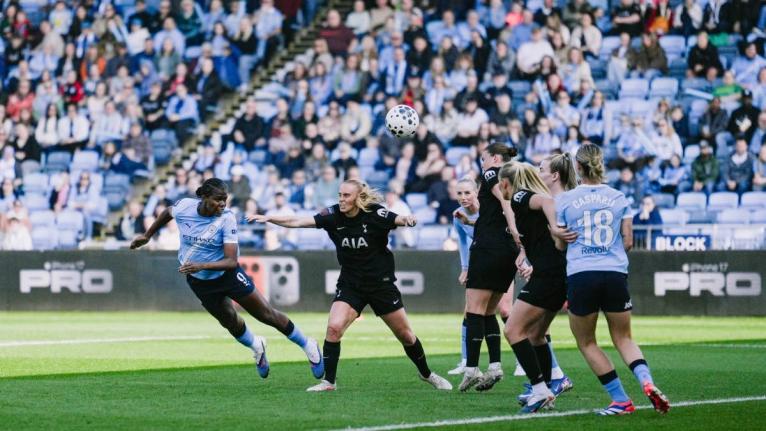 Courtesy of mancity.com 
Manchester City and Jamaica striker Khadija Shaw (left) plants a powerful header on her way to scoring one of three goals in a Women’s Super League game against Tottenham Hotspur at the Joie Stadium in Manchester, England yesterd