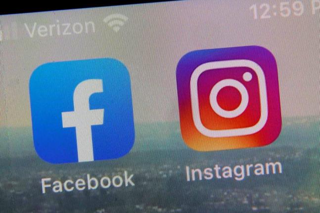 A view of the mobile phone app logos for, from left, Facebook and Instagram in New York, October 5, 2021. (AP Photo/Richard Drew, file)