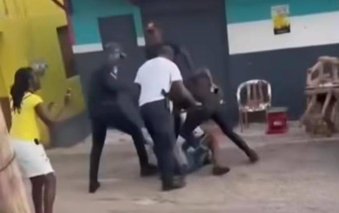 A screenshot from a video in which a man was seen being assaulted by cops in Trelawny.